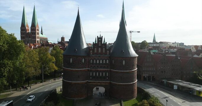 drone footage of the L&uuml;beck "Holstentor" in germany.  heading forward