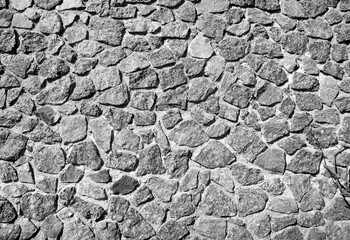 An old stone wall texture, black and white stone pattern surface background