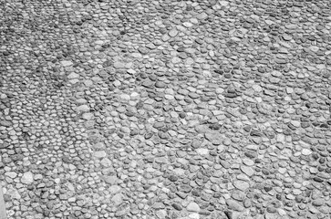 An old stone wall texture, black and white stone pattern surface background