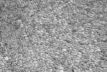 An old stone wall texture, black and white stone pattern surface background