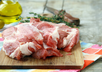 raw organic lamb meat on wooden board