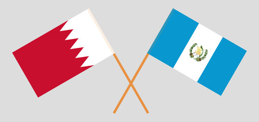 Crossed flags of Bahrain and Guatemala. Official colors. Correct proportion