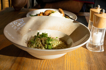 Mushroom Risotto on Elegant Restaurant Plate, Porcini Mushrooms Rissoto, Delicious Italian Risoto Lunch