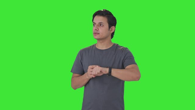 Indian man waiting for someone Green screen