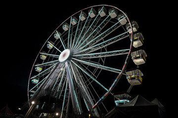 Illuminated Ferris Wheel Against Night Sky: A Beacon of Fun and Entertainment, ai generative