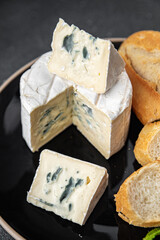 creamy blue cheese with intense flavor soft mold cheese delicious healthy eating cooking appetizer meal food snack on the table