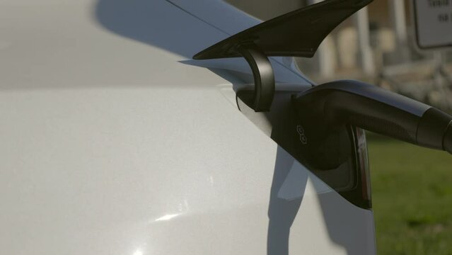 CCU: Charging electric luxury vehicle at the supercharger