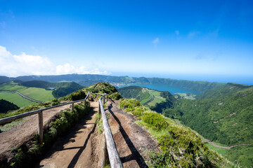 Fototapeta na wymiar Pathway leading to Miradouro da Boca do Inferno with the view of Sete Cidades in São Miguel island, Azores