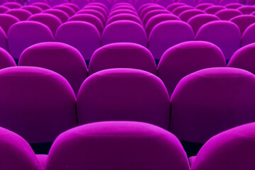 row of purple theater seats