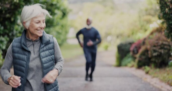 Senior couple, running and fitness on road in nature for workout, training or outdoor exercise together. Mature woman and man in sports, run or sprint on street for motivation, health and wellness
