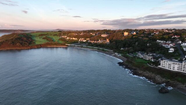 Editorial SWANSEA, UK - OCTOBER 15, 2023: Panoramic aerial view of Langland Bay on the Gower peninsula in Swansea, South Wales, UK.
