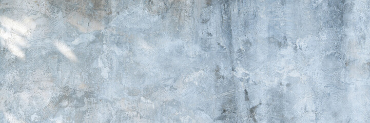 Old gray concrete wall texture. Exposed concrete surface offers blank canvas for creativity and design.