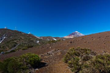 Image of the snow-capped volcano Teide with surrounding nature