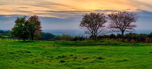 Panoramic view of sunset from Werneth Low country park in Greater Manchester UK. 