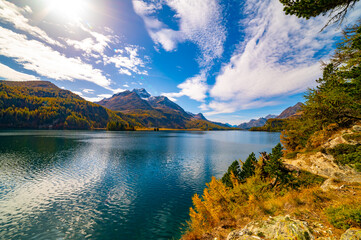 Lake Sils Maria, in the Engadine, photographed in autumn, with its landscape and the mountains above it.
