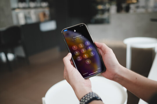 Bangkok. Thailand. October 19,2023 : Face id lock on Iphone 15 pro in smartphone screen close up view.