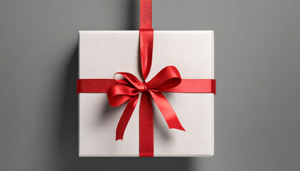Hanging minimal gift box rounded square sign paper card with red ribbon rope bow isolated on grey background with shadow minimal conceptual 3D rendering