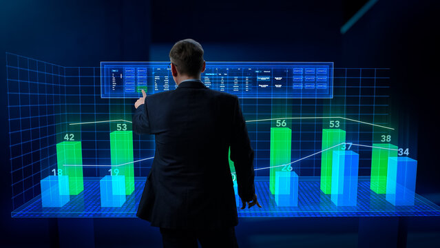 Businessman Working in a Minimalistic Digital Space. Manager Using a Virtual Touch Screen Hologram with Multiple Options, Generating Percentage Charts and Infographics Based on Financial Big Data