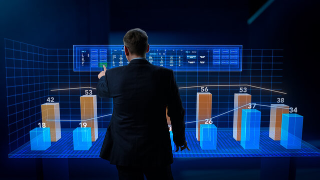 Businessman Working in Minimalistic Digital Space. Manager Using a Virtual Touch Screen Hologram with Multiple Options, Generating Percentage Charts and Infographics Based on Financial Big Data