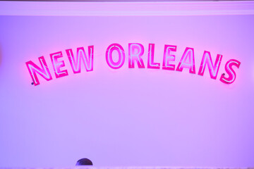 Neon New Orlean sign on restaurant wall