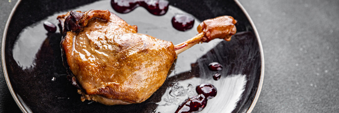 duck leg confit berry sauce poultry meat eating cooking meal food snack on the table copy space food background rustic top view
