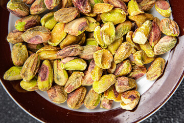 pistachios peeled nut healthy eating cooking appetizer meal food snack on the table copy space food background rustic top view