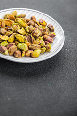 pistachios peeled nut healthy eating cooking appetizer meal food snack on the table copy space food background rustic top view