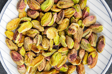 pistachios peeled nut healthy eating cooking appetizer meal food snack on the table copy space food background rustic top view