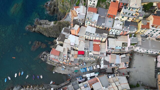 Europe, Italy, Liguria, Cinque Terre - Drone aerial view of Riomaggiore - The Cinque Terre are an increasingly popular tourist attraction for tourists from all over the world Unesco Heritage 
