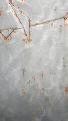 Background of half-rusted metal plates glued together with welding points
