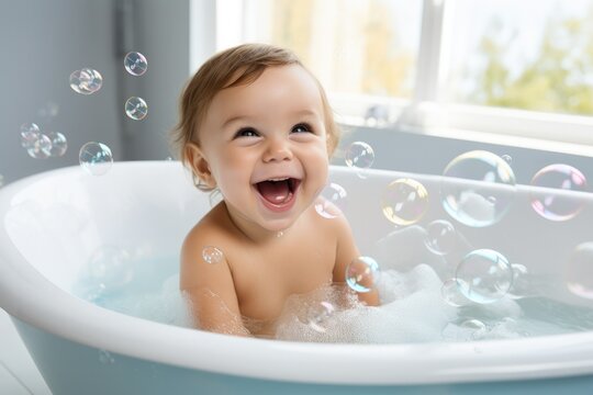 Baby taking a bath with foam and soap bubbles.