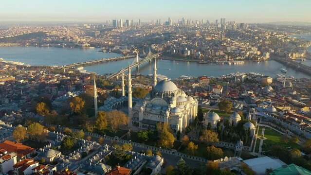 Aerial view of Suleymaniye Complex Mosque with Istanbul city view. The drone circles around the mosque. Istanbul Turkey.