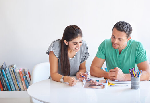 Creative people, teamwork and photograph in business meeting, magazine planning and collaboration or ideas. Graphic designer, man and woman of print catalog or portfolio for startup, marketing agency