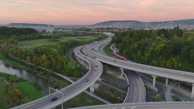 sunset time zurich city district traffic street road interchange aerial panorama 4k switzerland