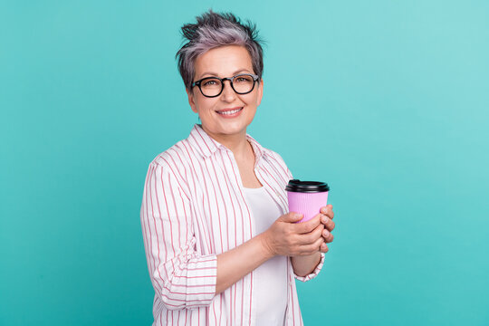 Photo portrait of optimistic young lady syed short haircut hold how cacao cup good morning sweet taste isolated on cyan color background