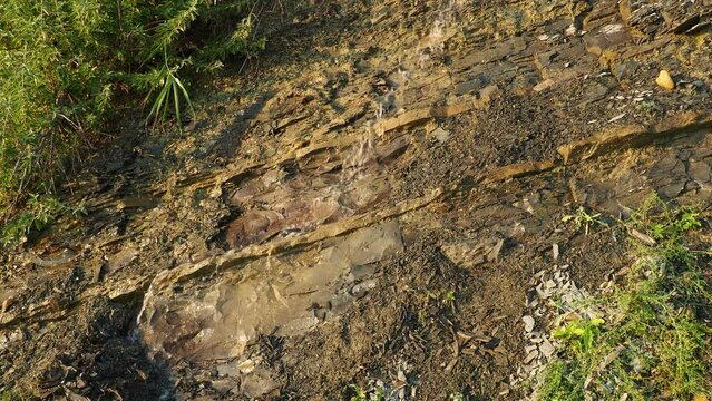 Flysch is a series of marine sedimentary rocks that are predominantly clastic in origin. Alternation of lithological layers. A stream of water or sewage running down a rock. Caucasus Mountains