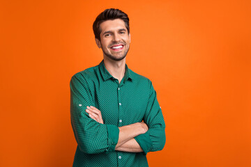 Portrait of businessman confident company owner wear green formal shirt folded arms best sales...