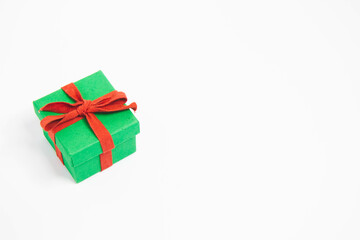 Present. Gift box with a bow. New Year's surprise. Red and green box with a gift