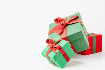 Present. Gift box with a bow. New Year's surprise. Red and green box with a gift