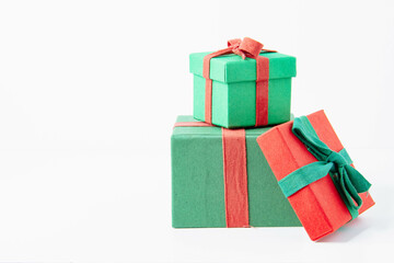 Present. Gift box with a bow. New Year's surprise. Red and green box with a gift