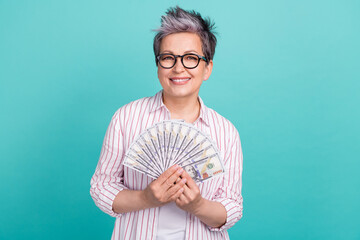 Photo of representative financial director businesswoman pensioner holding savings jackpot isolated...