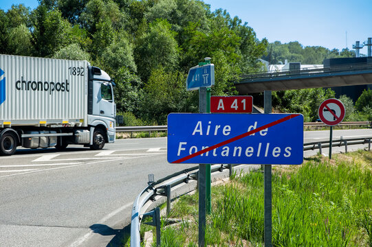 Annecy, France - March 2, 2023: Service station Aire de Fontanelles along A41 in Annecy and a truck of Chronopost company