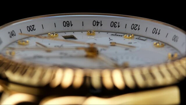 Close Up Of Stylish Luxury Man Wrist Watch With Moving Hand And Multiple Dials. Men's chronograph watch in metal with sapphire crystal. closeup view of rotating watch, running second arrow. white dial