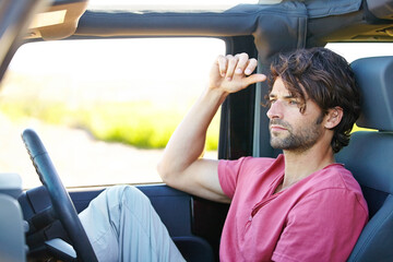 Car road trip, travel and man looking at direction, detour way and thinking of destination route,...