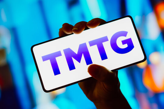 October 18, 2023, Brazil. In this photo illustration, the Trump Media and Technology Group (TMTG) logo is displayed on a smartphone screen.
