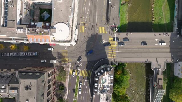 sunny day zurich city center canal traffic street crossroad bridge aerial topdown panorama 4k switzerland