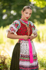 
Slovak folklore. Slovakian folklore girl. Beuatiful young girl in slovak folk dress