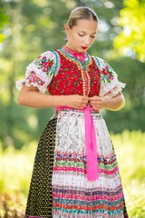 
Slovak folklore. Slovakian folklore girl. Beuatiful young girl in slovak folk dress
