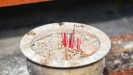 Burning incense at Cetho Karanganyar temple, Indonesia.