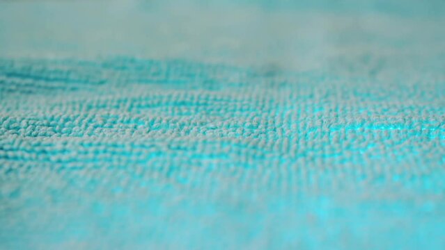 Close up of blue woven texture made of wool as background